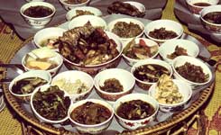 Image of A variety of Lao food served on a traditional serving platter