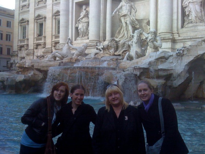 family at trevi fountain